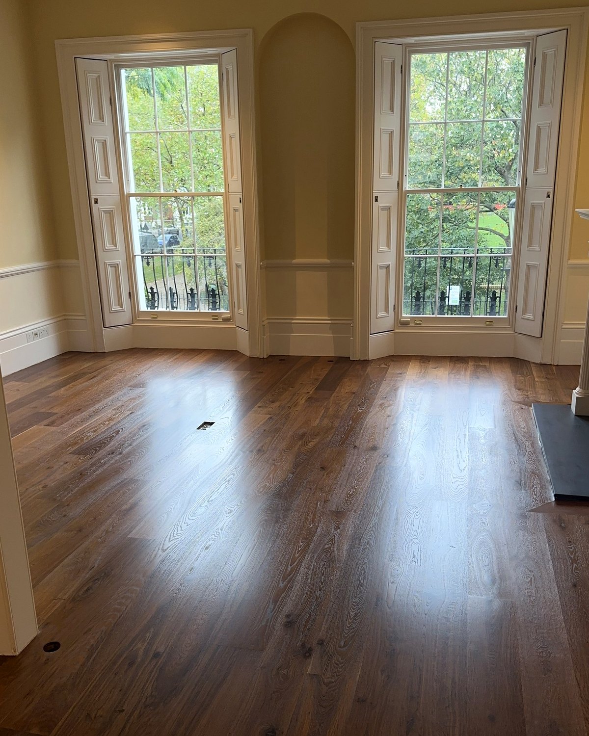Dark-stained oak boards in a London living room
