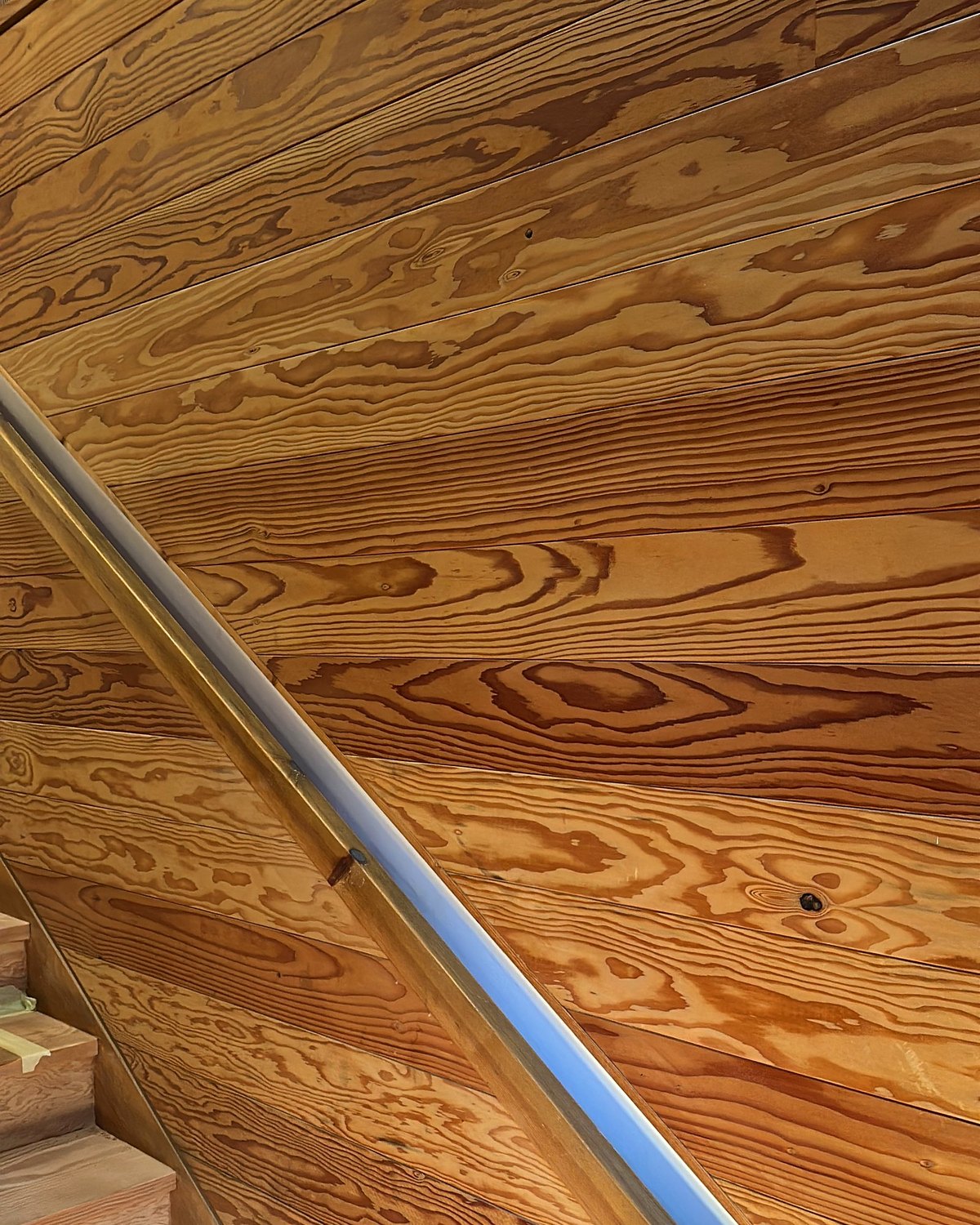 Pitch pine staircase with steel handrail